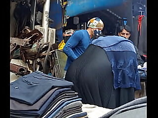 Muslim aunty bending ass at shop